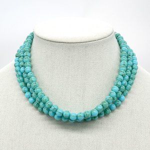 Turquoise 3 tier necklace with silver chain.